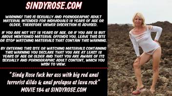 Sindy Rose fuck her ass with big red anal dildo & anal prolapse at lava rock